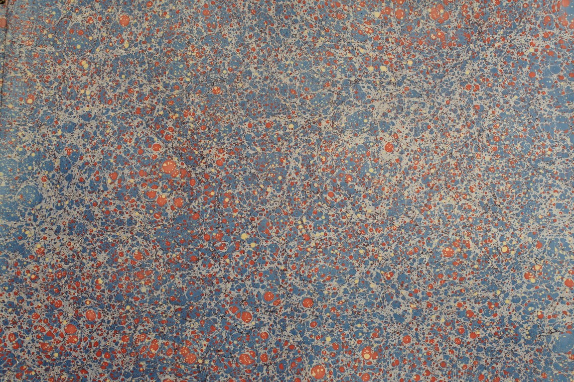 Caillouté Marine et vermillon